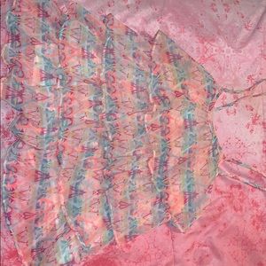 Multicolored strap shirt.